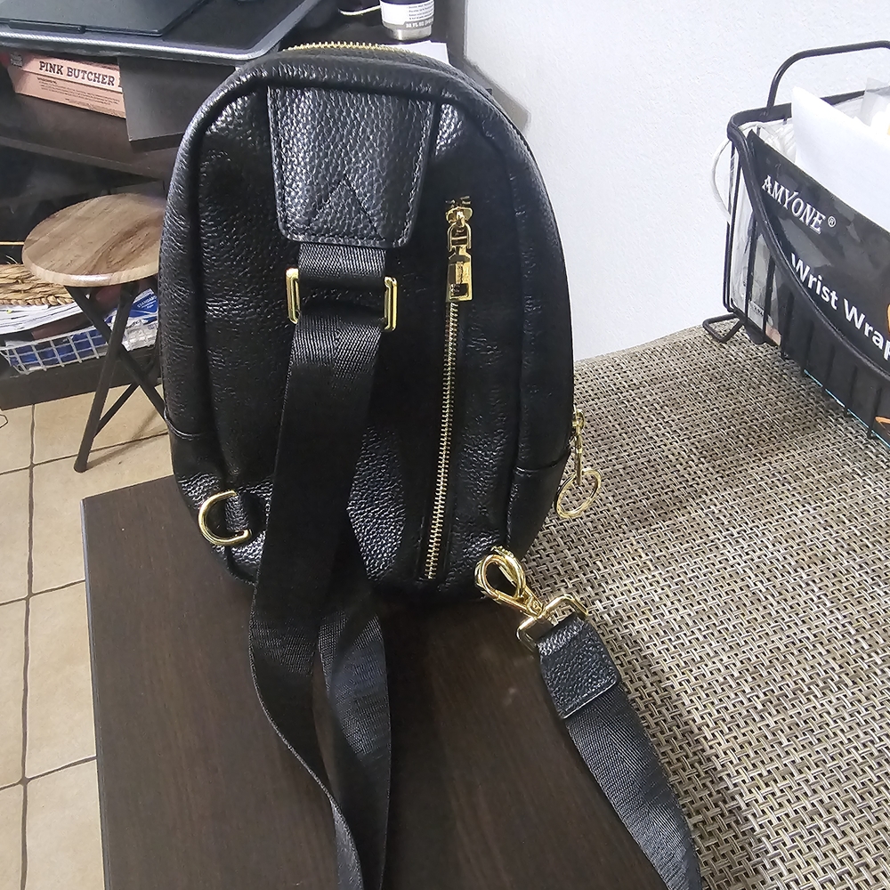 Elegant Black Leather Belt Bag with Gold Accents